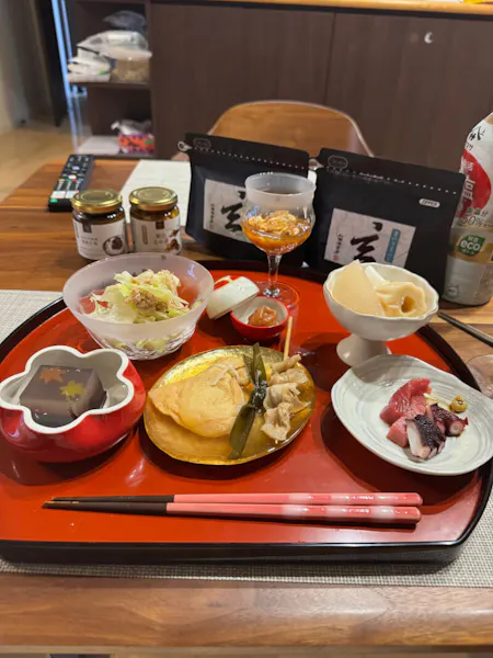Wagyu beef, dumplings, and grilled fish set with rice and miso soup.
