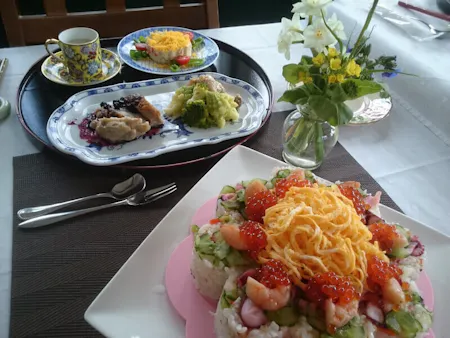 homemade CHIRASHI-ZUSHI( looks like decoration cake) for special party using fish and vegetables