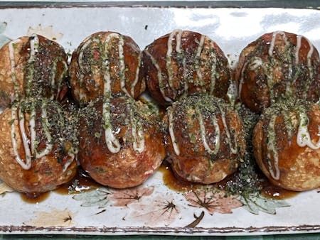 【Takoyaki】
A light meal that is baked in a special plate.
Traditional Japanese soul food