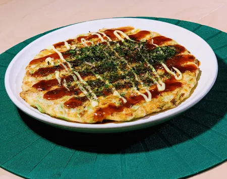 Okonomiyaki and Yakisoba Japanese hot-plate dishes