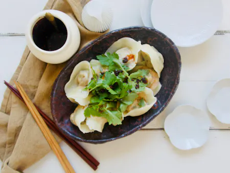 Delicious vegan meal and a bento box with leftovers such as boiled dumplings, mapo tofu etc
